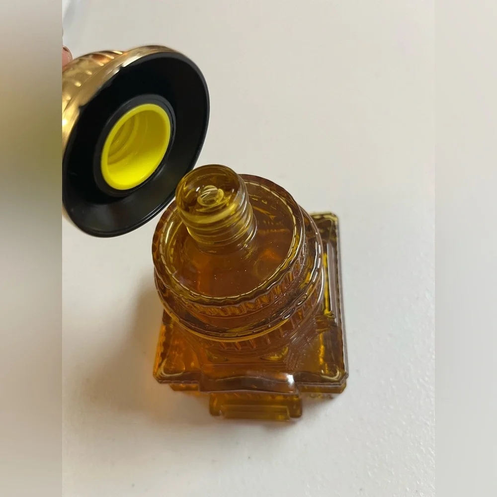 Vintage Avon Capitol Building Amber and Gold Cologne Bottle